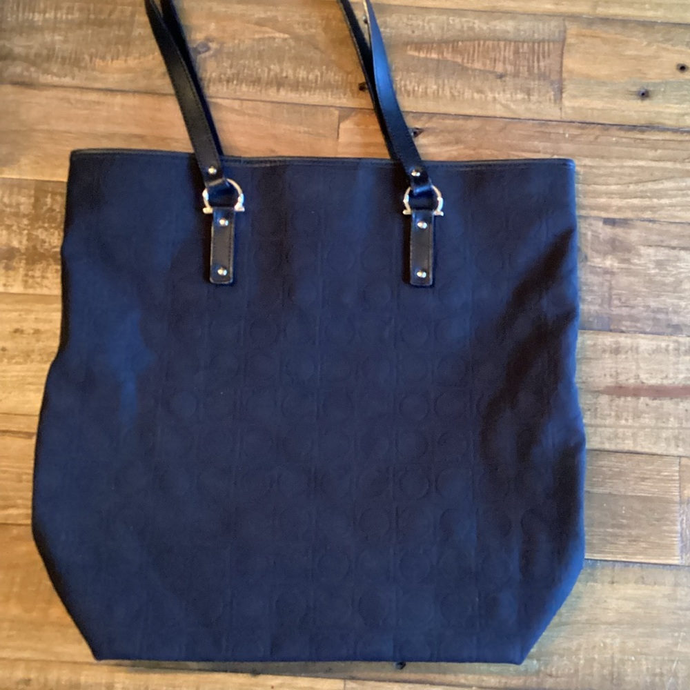 Salvatore Ferragamo, black & red mono roll up canvas tote with silver hardware.